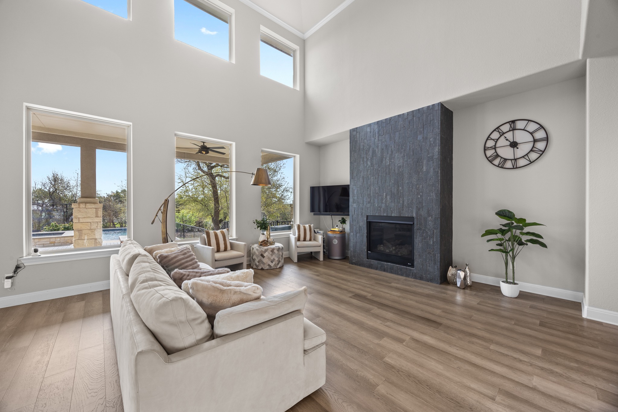 15705 Colinas Cove Bee Cave, TX 78738 - Photo 11 of 40 a living room with furniture and a fireplace