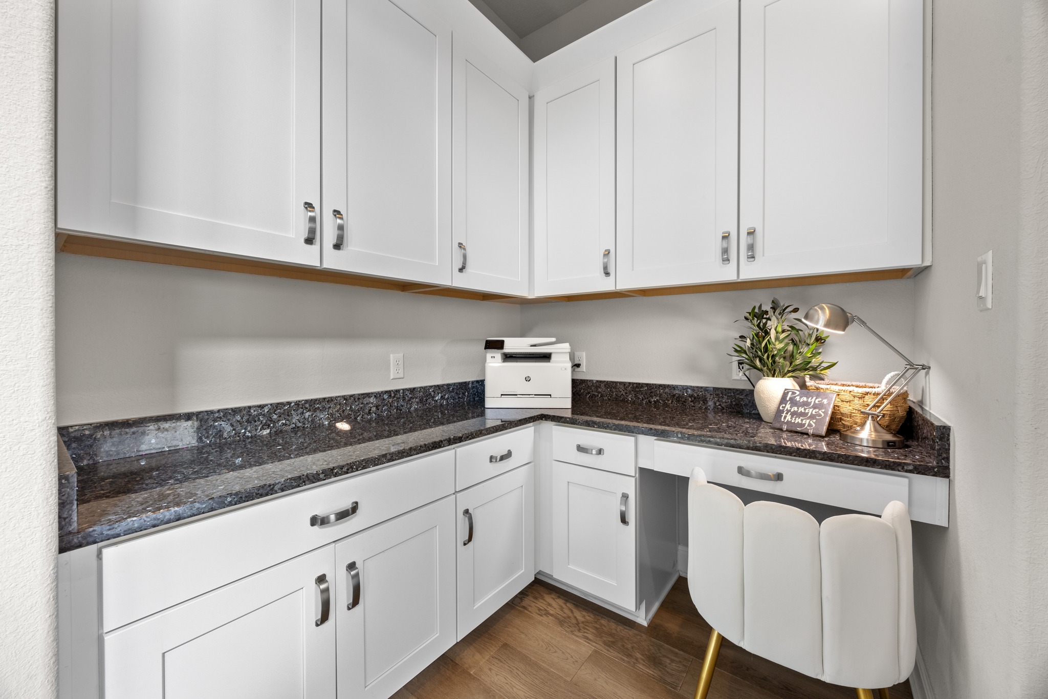15705 Colinas Cove Bee Cave, TX 78738 - Photo 25 of 40 a kitchen with white cabinets and sink