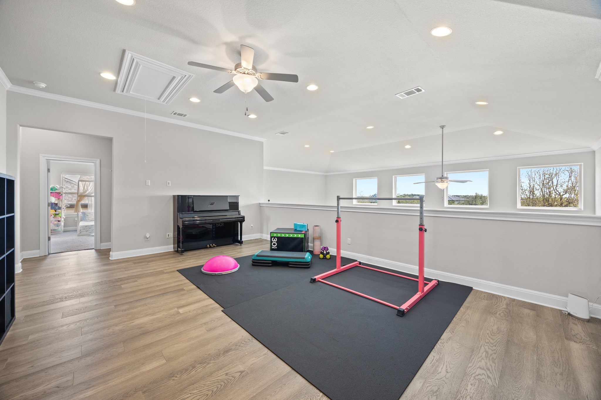 15705 Colinas Cove Bee Cave, TX 78738 - Photo 27 of 40 a living room with furniture and flat screen tv