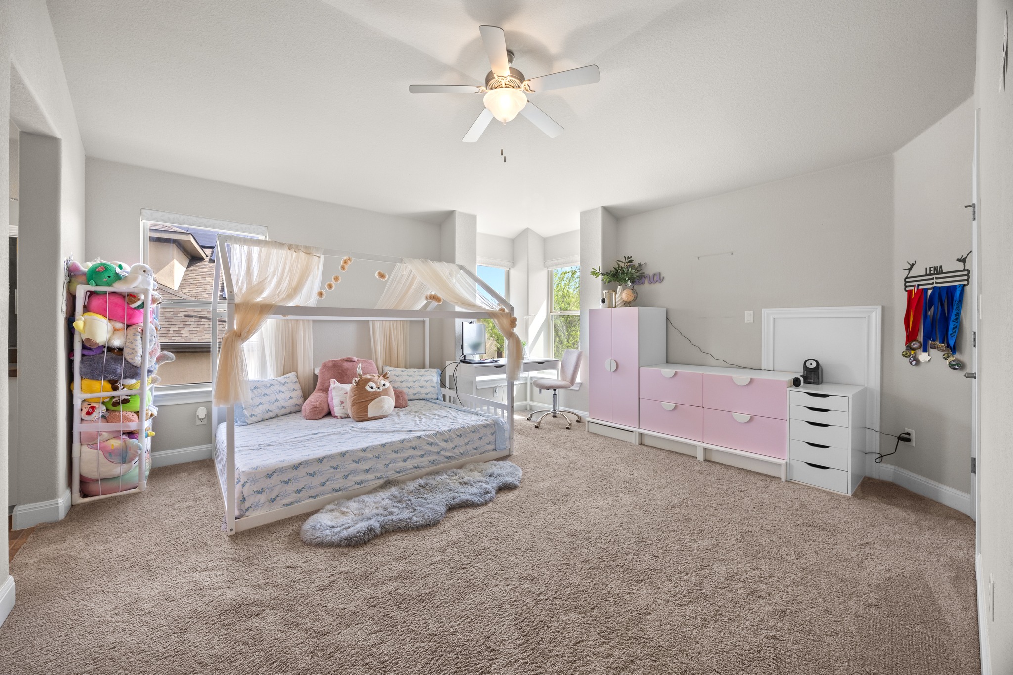 15705 Colinas Cove Bee Cave, TX 78738 - Photo 31 of 40 Carpeted bedroom featuring baseboards and a ceiling fan