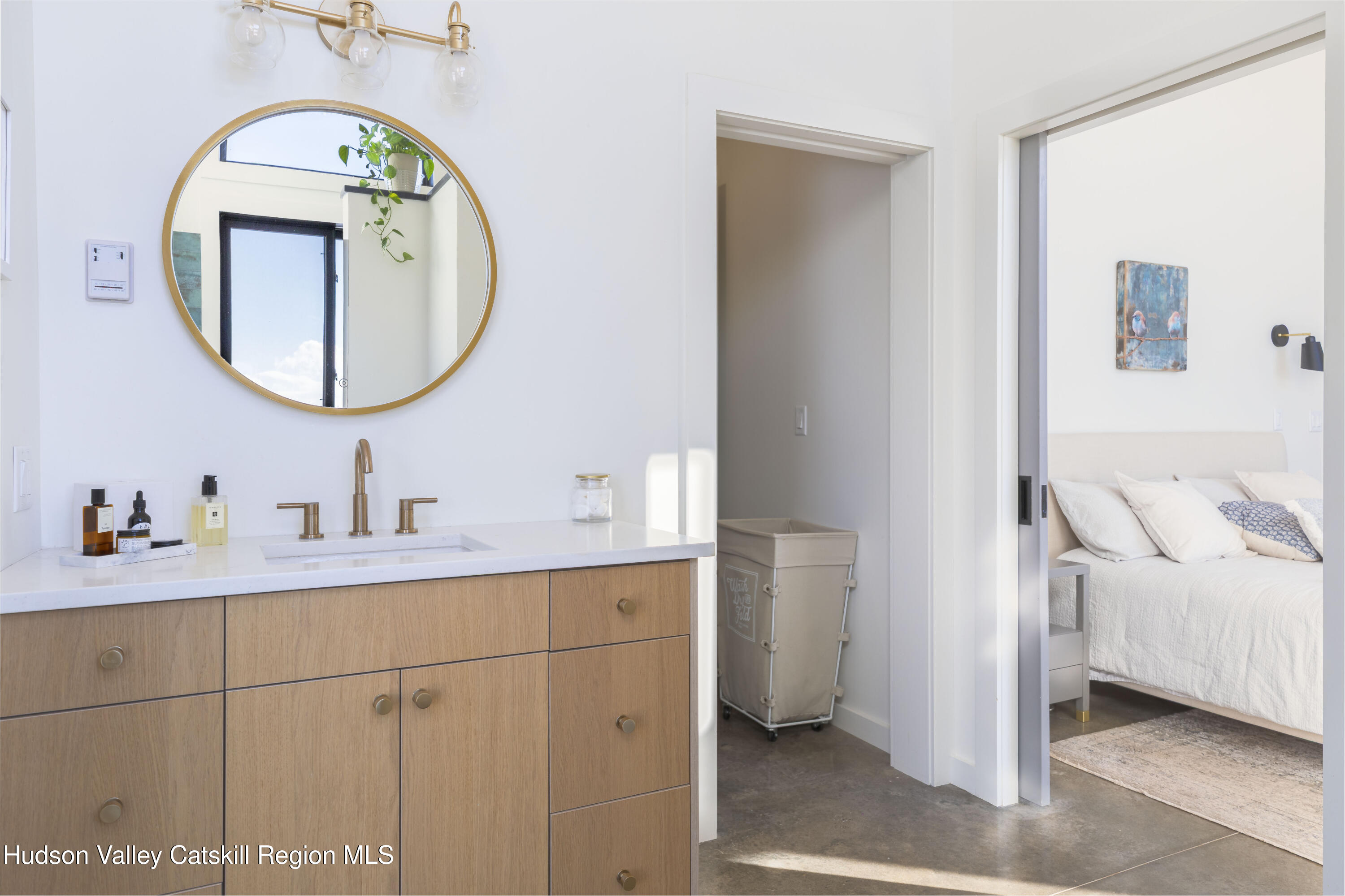 380 Decker Road Stamford, NY 12167 - Photo 19 of 31 a bathroom with a sink and a mirror
