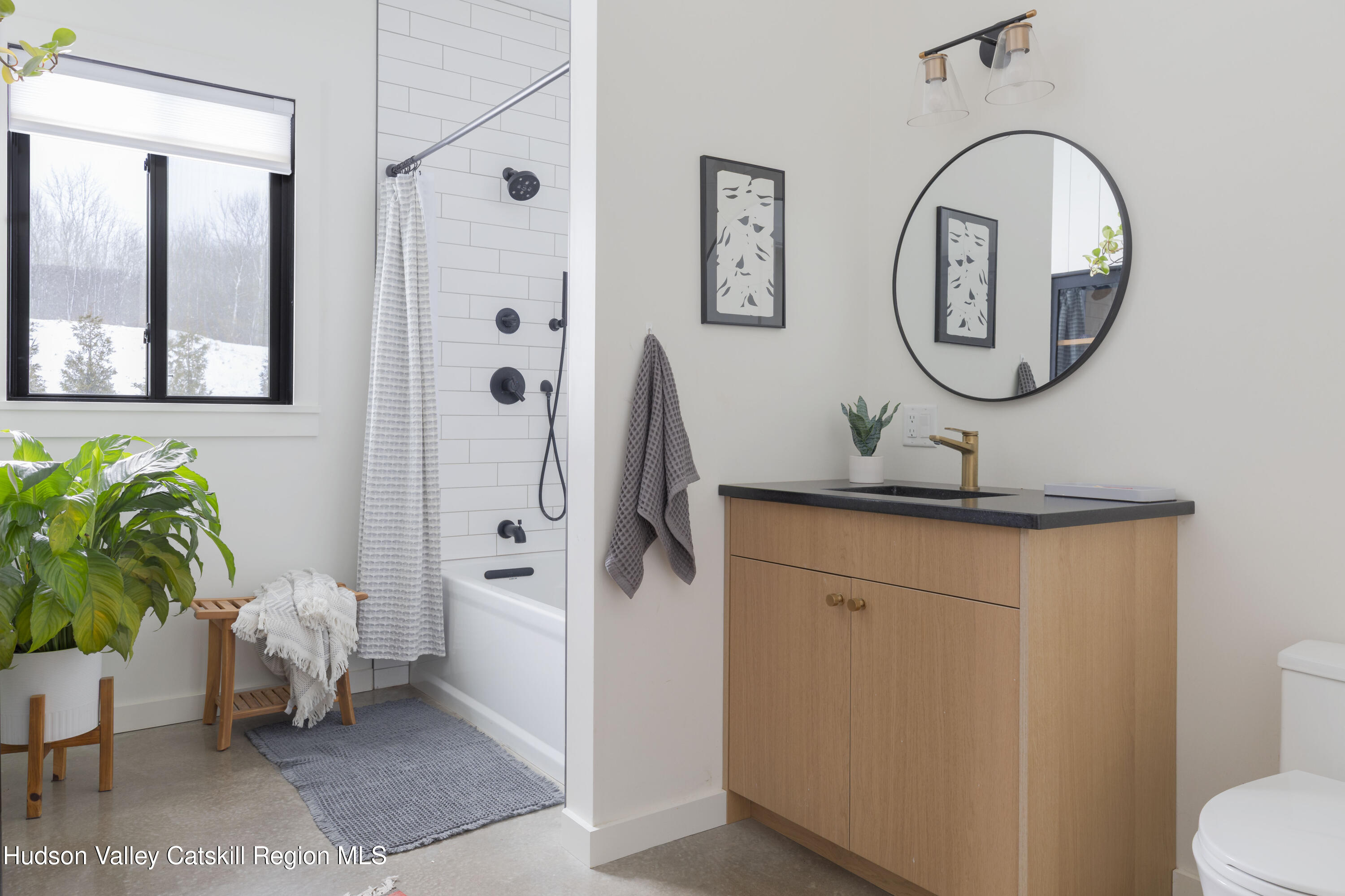 380 Decker Road Stamford, NY 12167 - Photo 24 of 31 a bathroom with a toilet a sink and a mirror