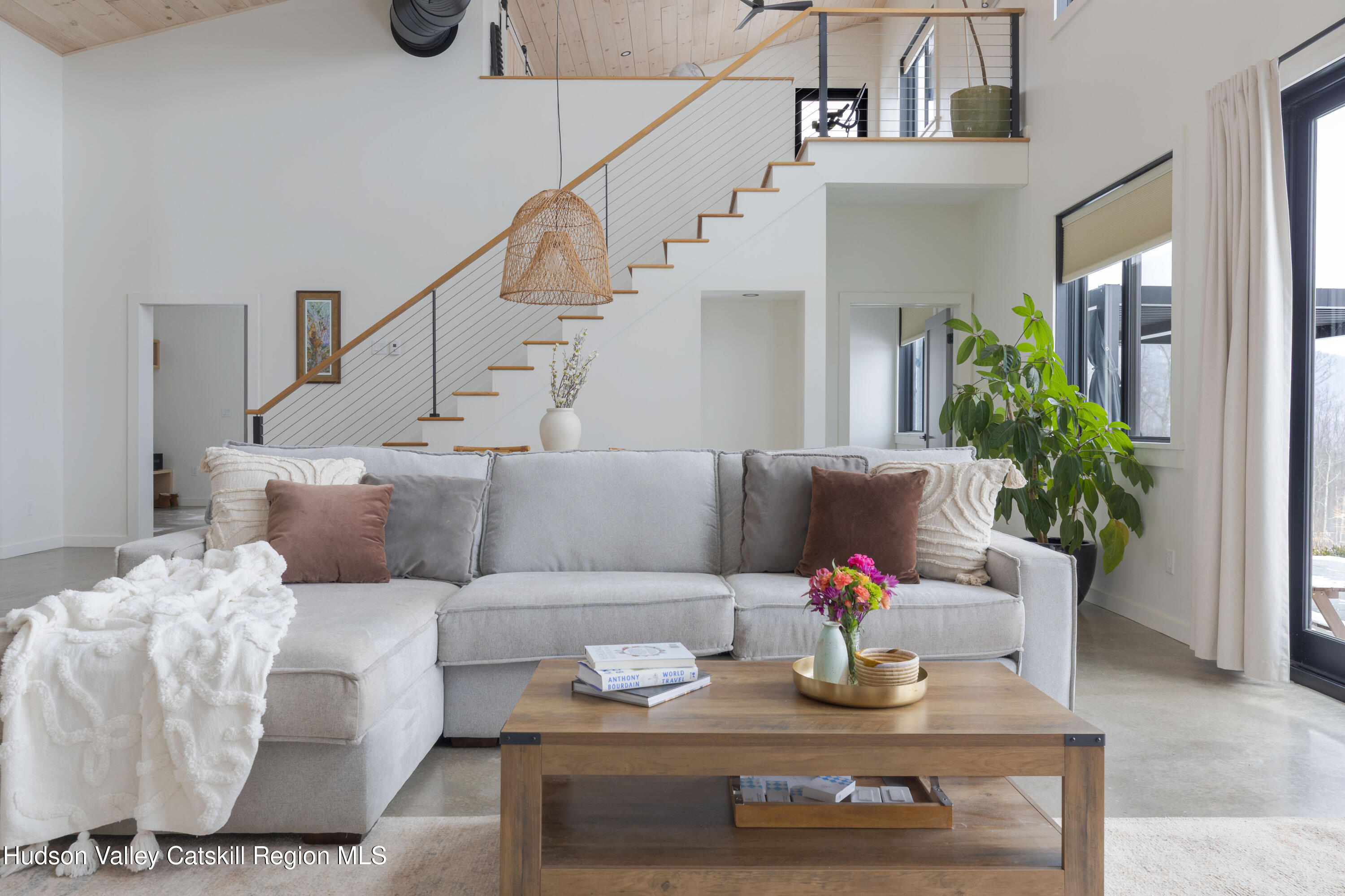 380 Decker Road Stamford, NY 12167 - Photo 26 of 31 a living room with furniture and flowers
