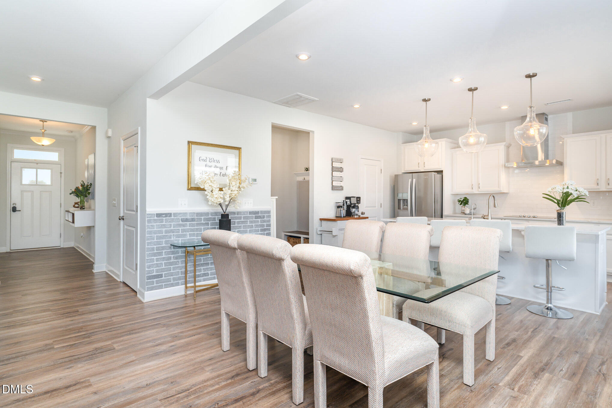 73 Lockhaven Drive Garner, NC 27529 - Photo 9 of 38 a dining room with furniture and wooden floor