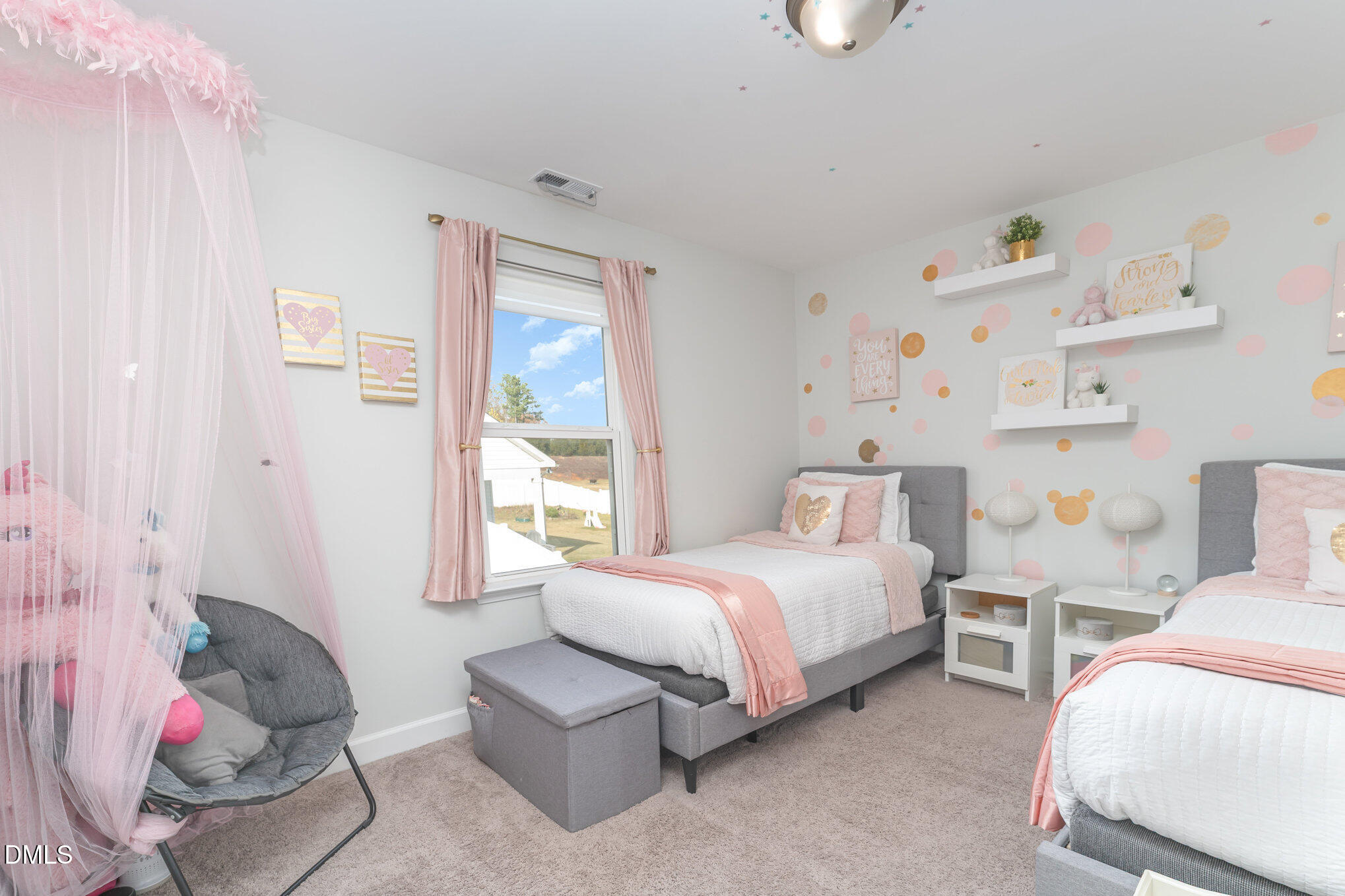 73 Lockhaven Drive Garner, NC 27529 - Photo 21 of 38 a bedroom with a bed and a window