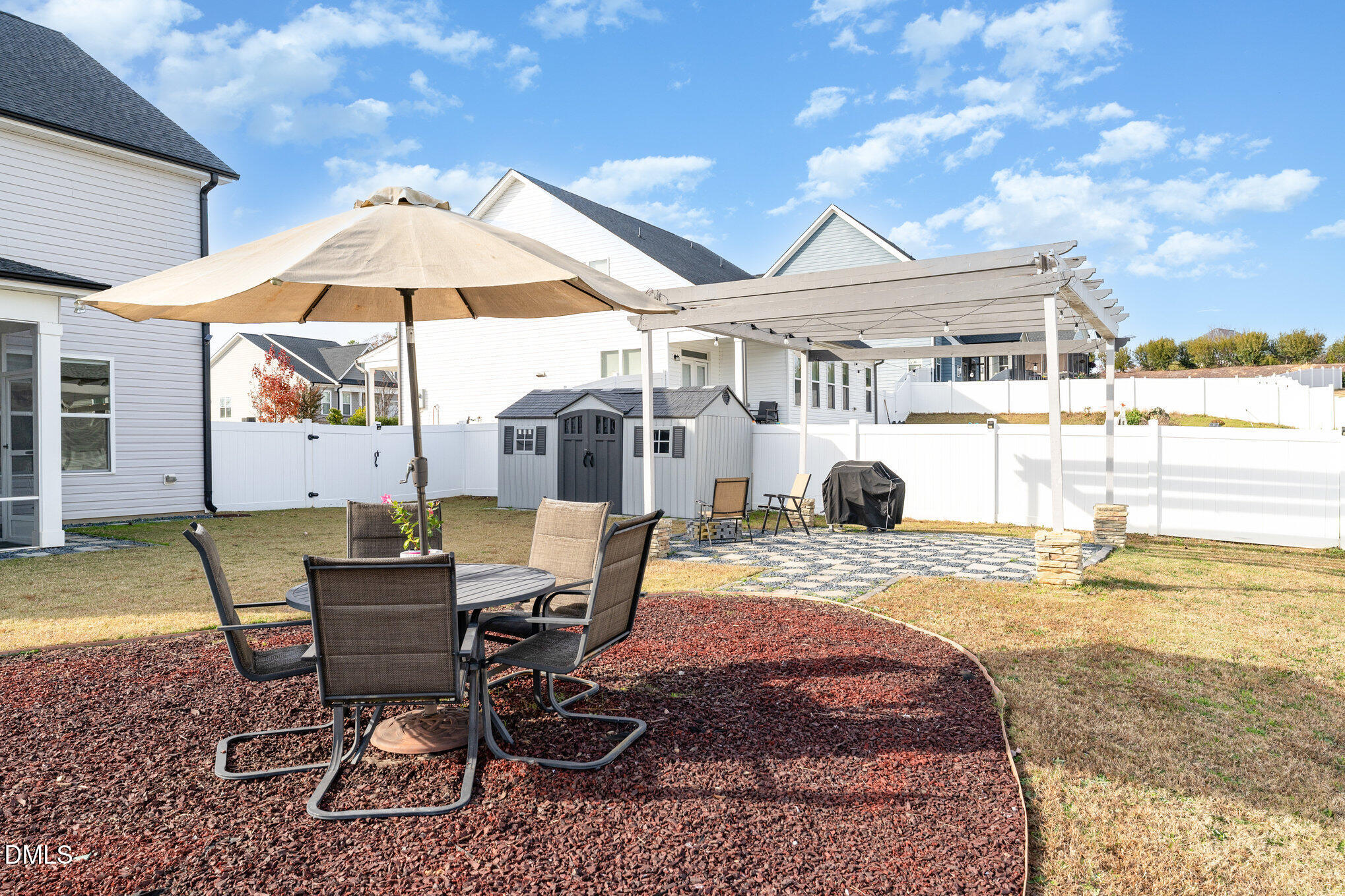 73 Lockhaven Drive Garner, NC 27529 - Photo 29 of 38 a view of a house with backyard and sitting area