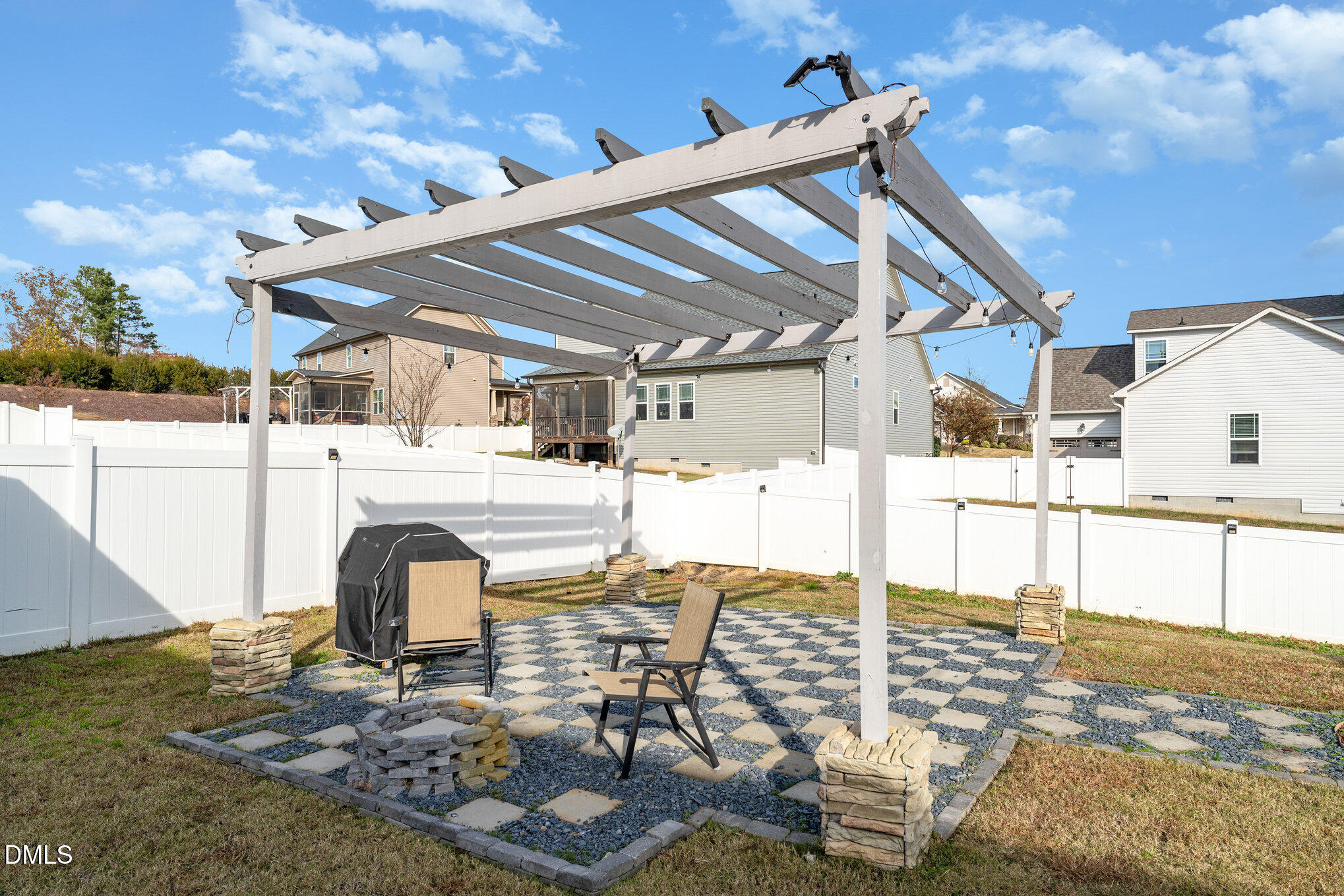 73 Lockhaven Drive Garner, NC 27529 - Photo 30 of 38 a view of a patio with table and chairs with wooden floor
