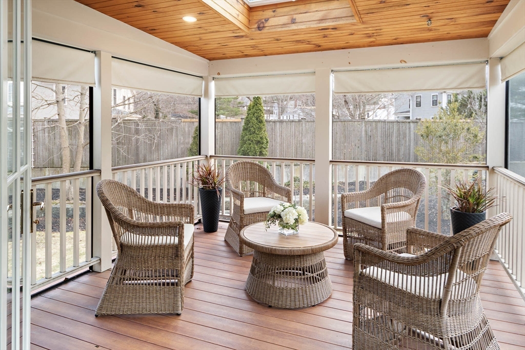 272 North Street Hingham, MA 02043 - Photo 5 of 17 a view of a porch with furniture and a garden