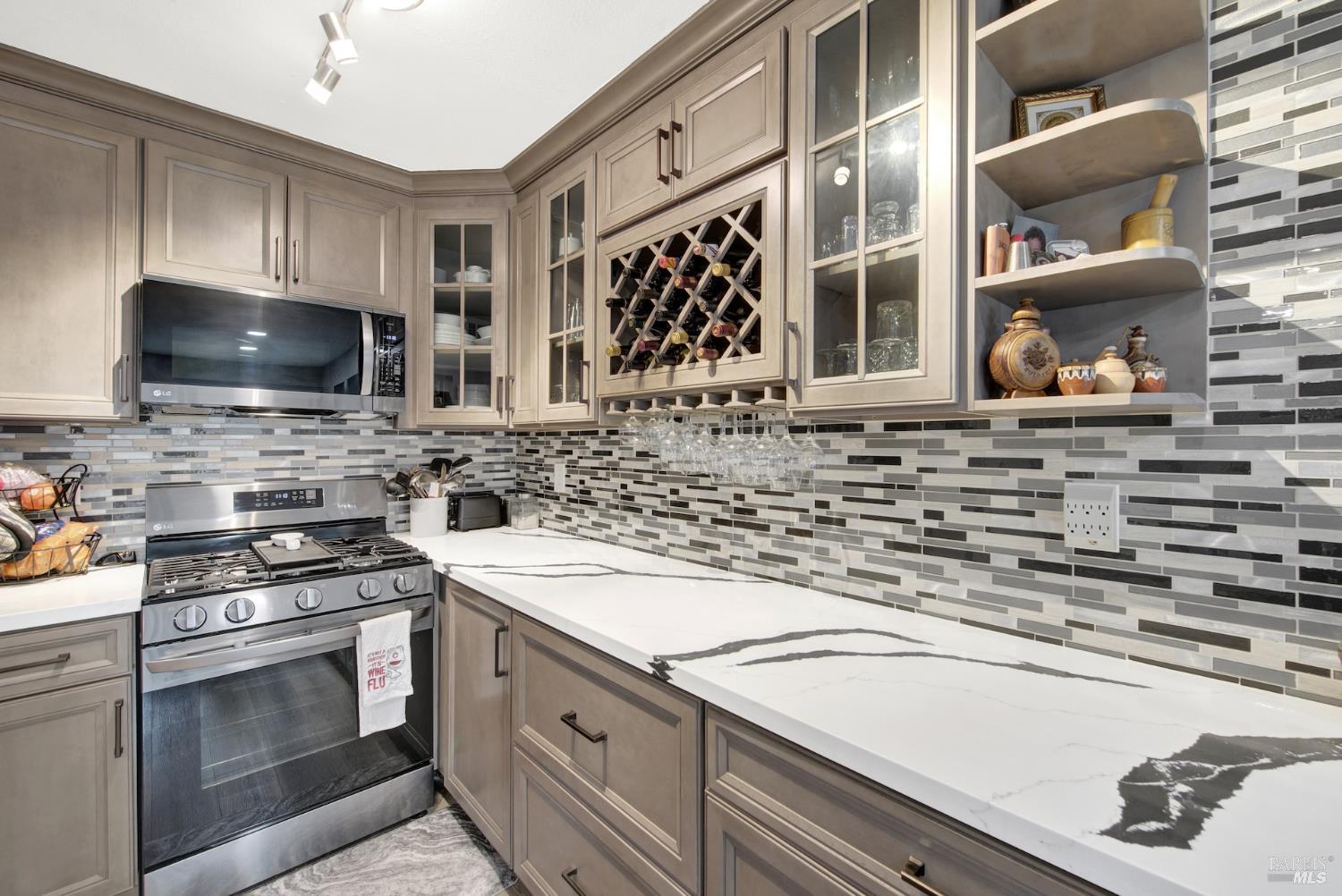 216 Apollo, Unit 7 Hercules, CA 94547 - Photo 14 of 29 a kitchen with stainless steel appliances a stove and a sink