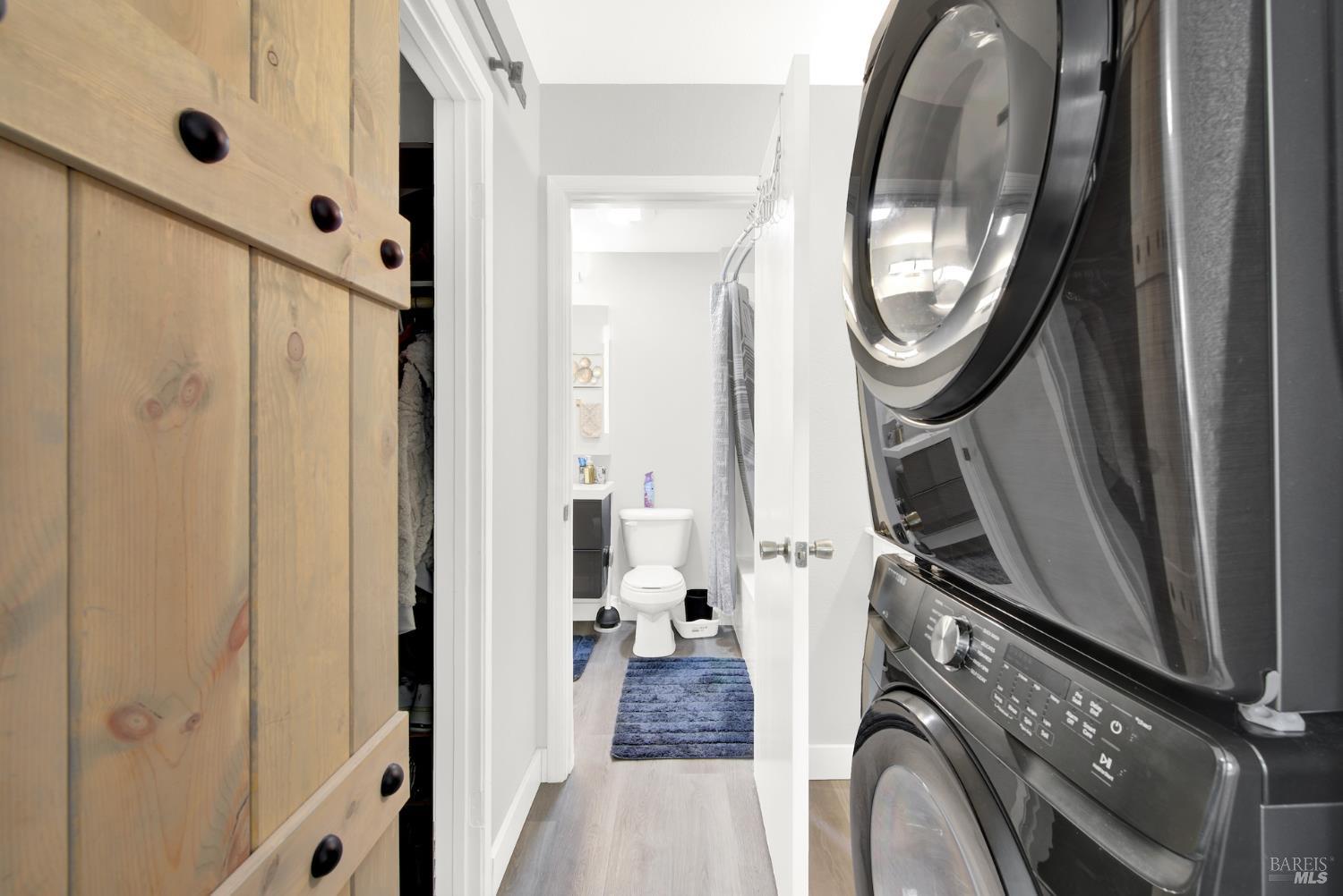 216 Apollo, Unit 7 Hercules, CA 94547 - Photo 20 of 29 a view of a hallway with washer and dryer
