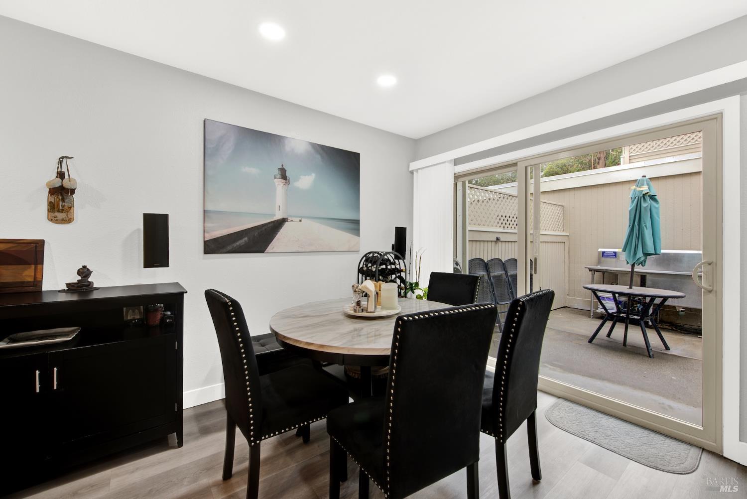 216 Apollo, Unit 7 Hercules, CA 94547 - Photo 9 of 29 a view of a dining room with furniture and window