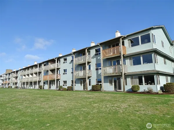 a front view of a building with outdoor space