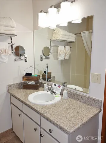 an empty room with a mirror