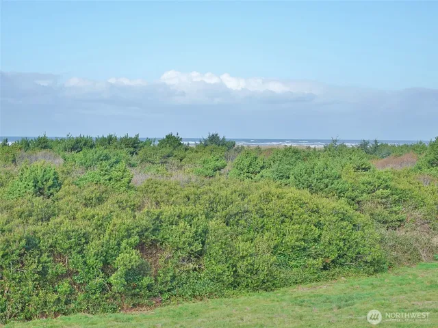 a room with furniture and large window