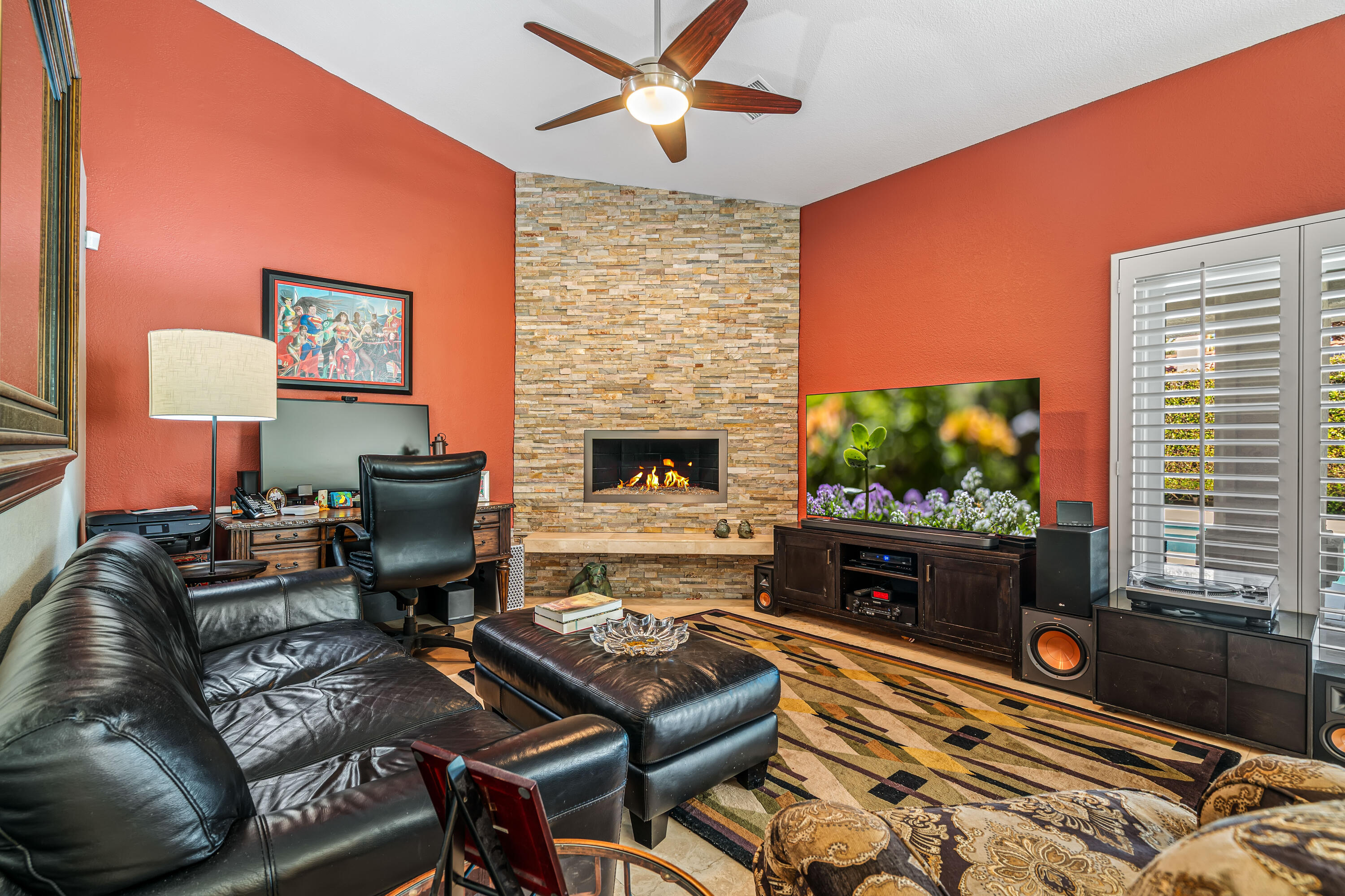 36690 Palm Court Rancho Mirage, CA 92270 - Photo 13 of 54 a living room with furniture fireplace and a flat screen tv