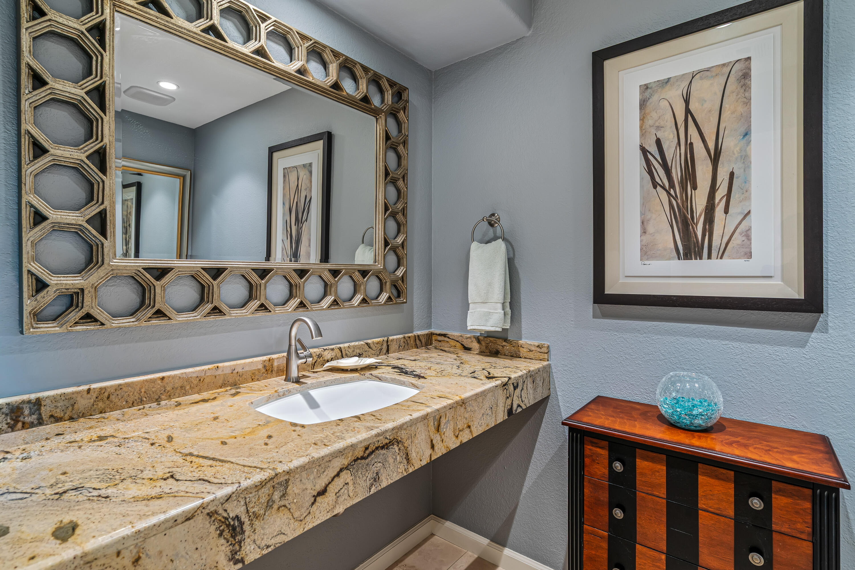 36690 Palm Court Rancho Mirage, CA 92270 - Photo 23 of 54 a bathroom with a sink and a mirror