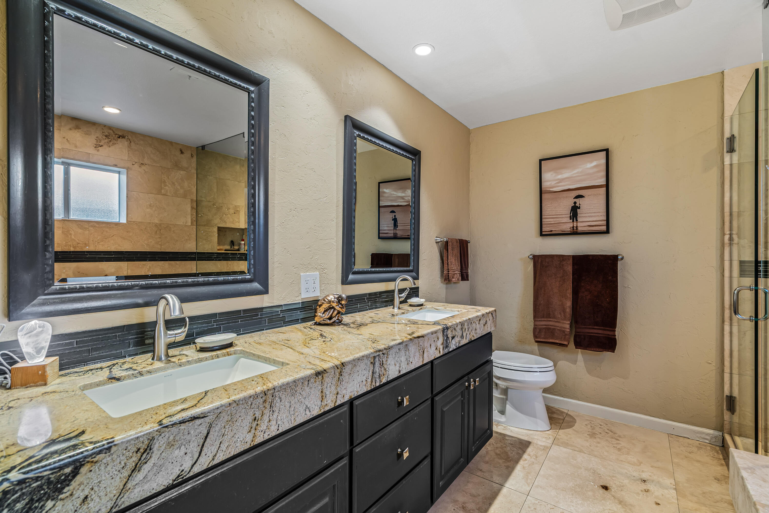 36690 Palm Court Rancho Mirage, CA 92270 - Photo 33 of 54 a bathroom with a granite countertop sink and a mirror