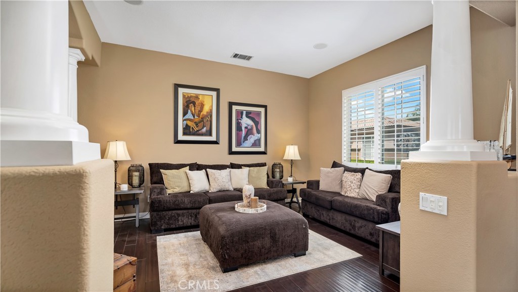 23894 Trail Duster Court Perris, CA 92570 - Photo 12 of 75 a living room with furniture and a window