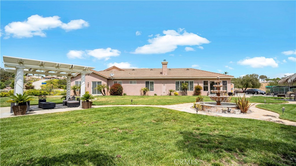 23894 Trail Duster Court Perris, CA 92570 - Photo 54 of 75 a view of a house with a big yard