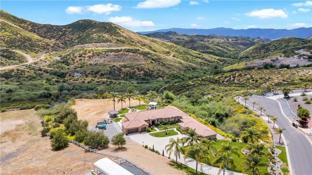 23894 Trail Duster Court Perris, CA 92570 - Photo 6 of 75 an aerial view of a house with a mountain