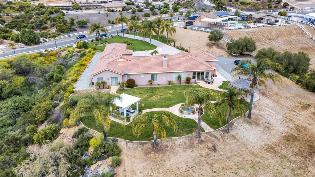 23894 Trail Duster Court Perris, CA 92570 - Photo 74 of 75 an aerial view of residential houses with outdoor space and trees