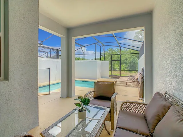 a view of a backyard of the house