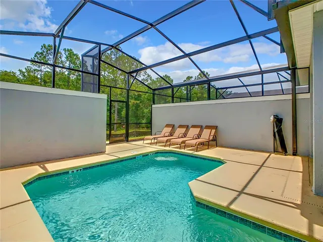 a backyard of a house with seating space
