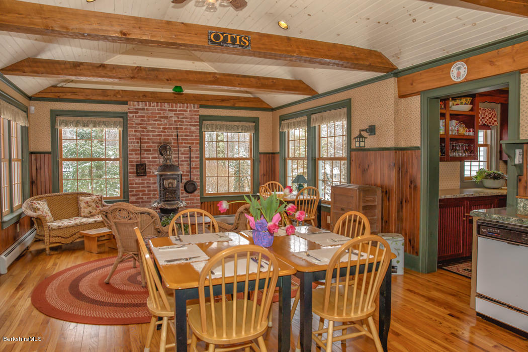 99 Kibbe Road Otis, MA 01029 - Photo 26 of 58 a view of a dining room with furniture window and outside view