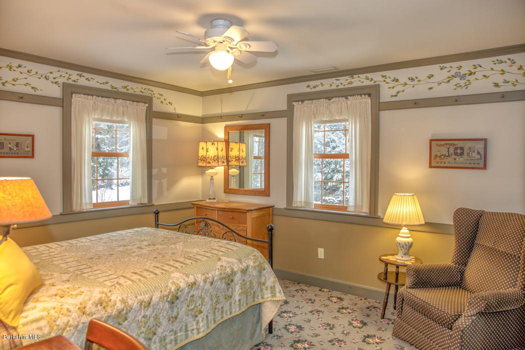 99 Kibbe Road Otis, MA 01029 - Photo 43 of 58 a bedroom with a bed couch and window