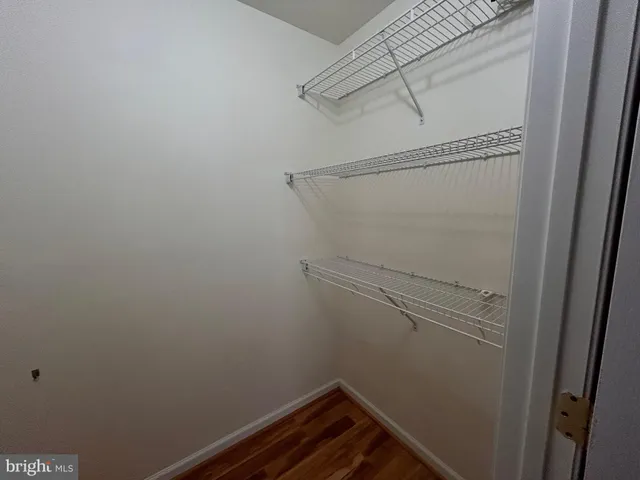 a view of small space with racks on the wall