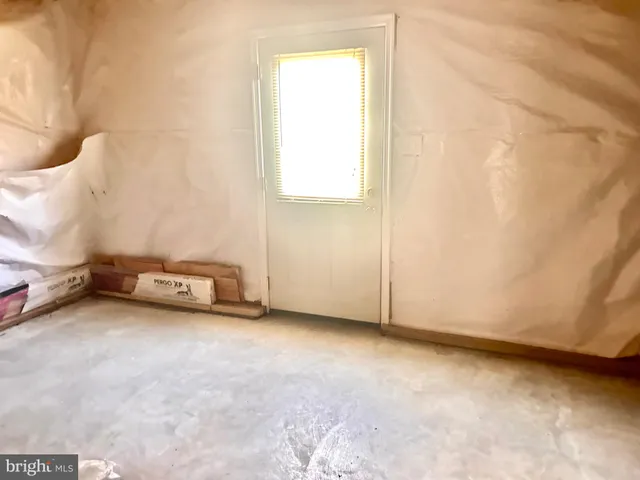 a view of a room with a window