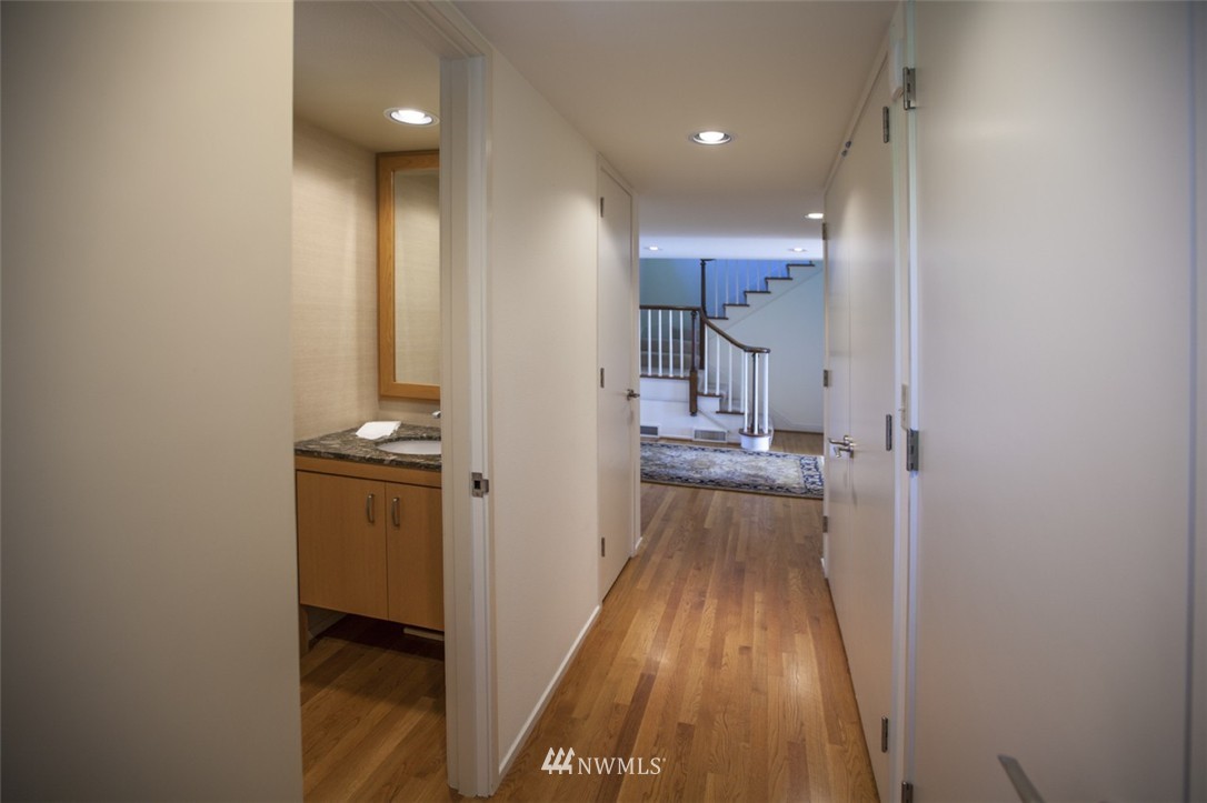 294 Briar Road Bellingham, WA 98225 - Photo 19 of 25 a view of a hallway with wooden floor and staircase