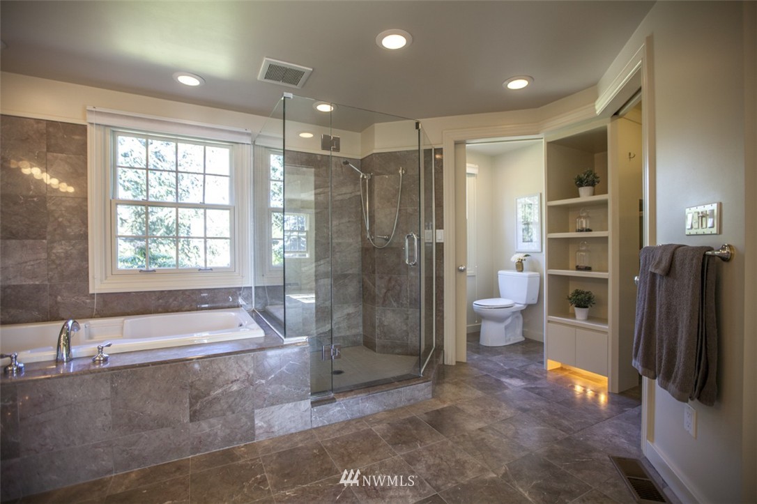 294 Briar Road Bellingham, WA 98225 - Photo 23 of 25 a bathroom with a double vanity sink toilet and shower