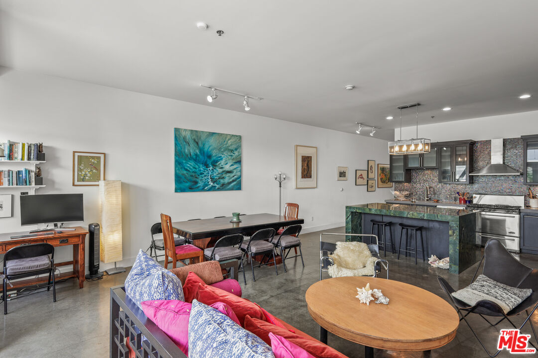 615 Hampton Drive, Unit A103 Venice, CA 90291 - Photo 15 of 20 a very nice looking dining room with a table and chairs