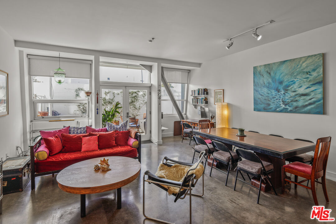 615 Hampton Drive, Unit A103 Venice, CA 90291 - Photo 18 of 20 a view of a livingroom with furniture and a table