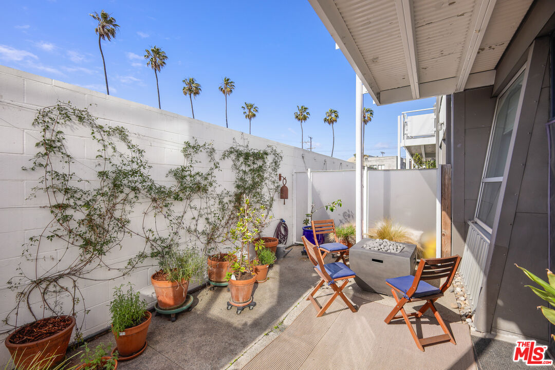615 Hampton Drive, Unit A103 Venice, CA 90291 - Photo 19 of 20 a view of a chairs in kitchen