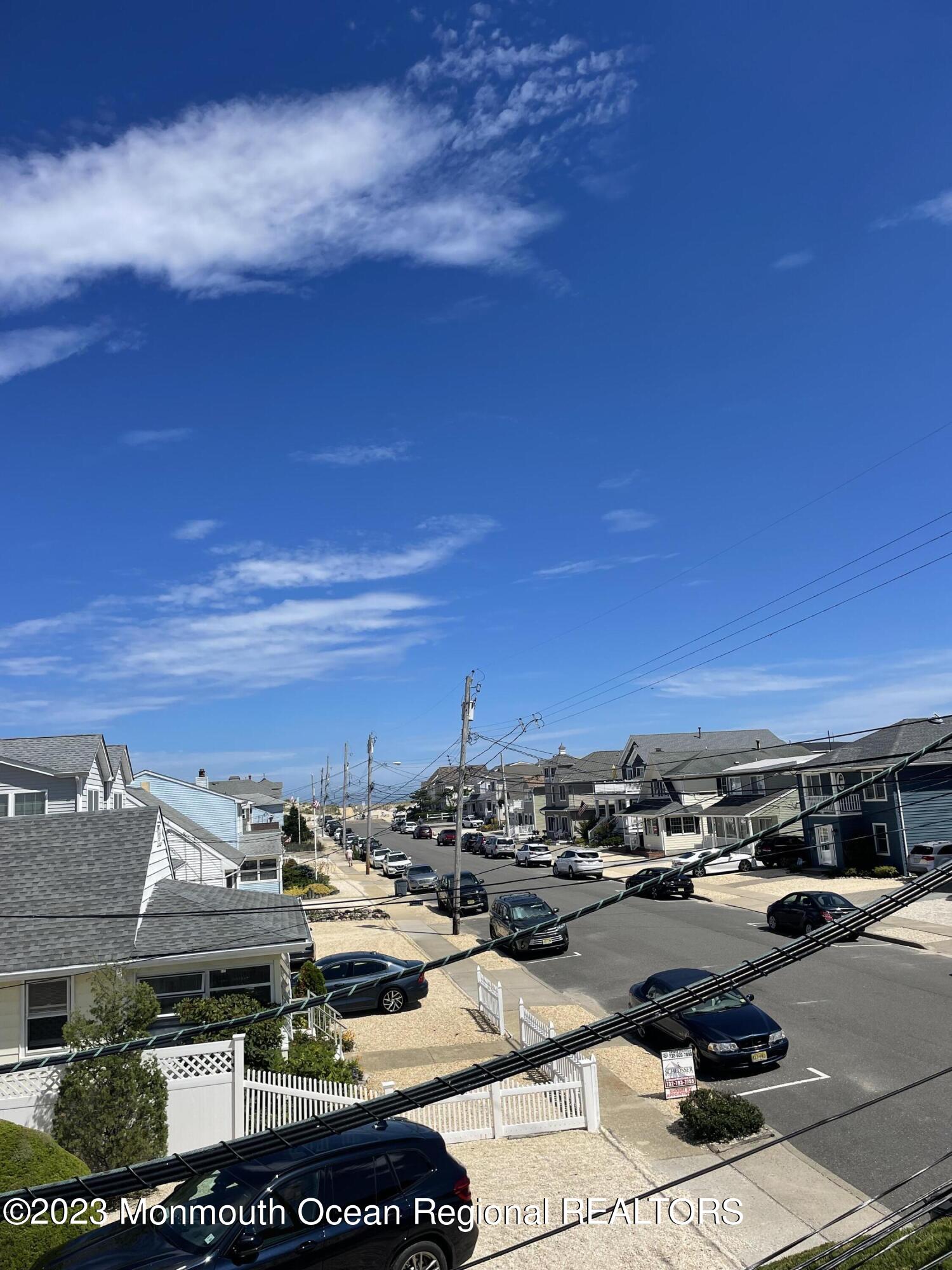 65 Grand Central Avenue Lavallette, NJ 08735 - Photo 12 of 15 a view of a parking area