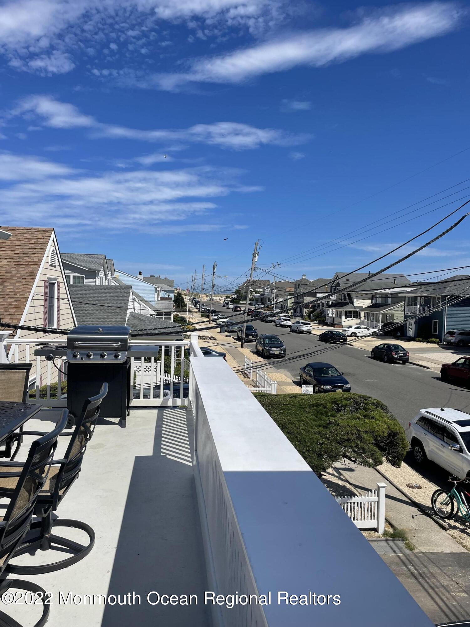 65 Grand Central Avenue Lavallette, NJ 08735 - Photo 13 of 15 a view of a balcony with chairs