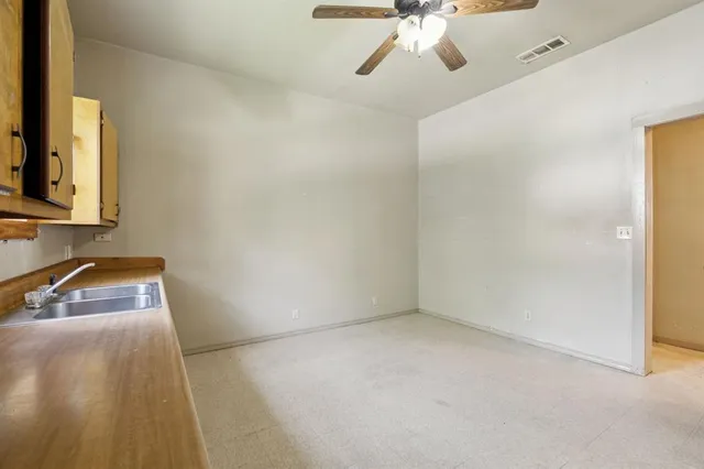 a view of a room with a sink