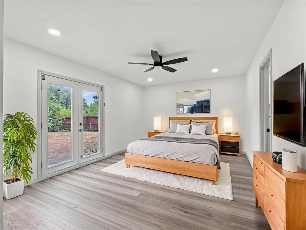 326 Bluebonnet Trail Garland, TX 75043 - Photo 14 of 25 Serene owner’s suite—virtually staged for lifestyle vision.