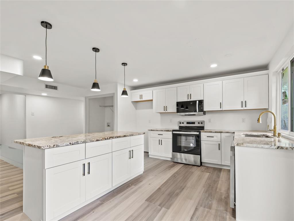 326 Bluebonnet Trail Garland, TX 75043 - Photo 2 of 25 Completely rennovated kitchen and dining area.