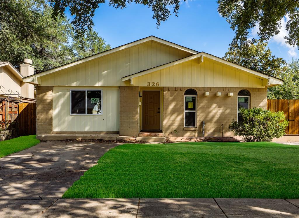 326 Bluebonnet Trail Garland, TX 75043 - Photo 21 of 25 Virtually staged yard to show potential—new sod negoitable for buyer at closing.