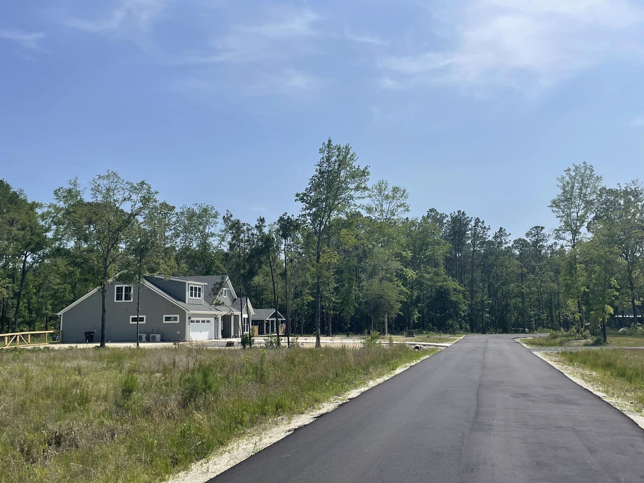 0 Raw Dew Drive Awendaw, SC 29429 - Photo 10 of 14 Raw Dew H neighboring left homes