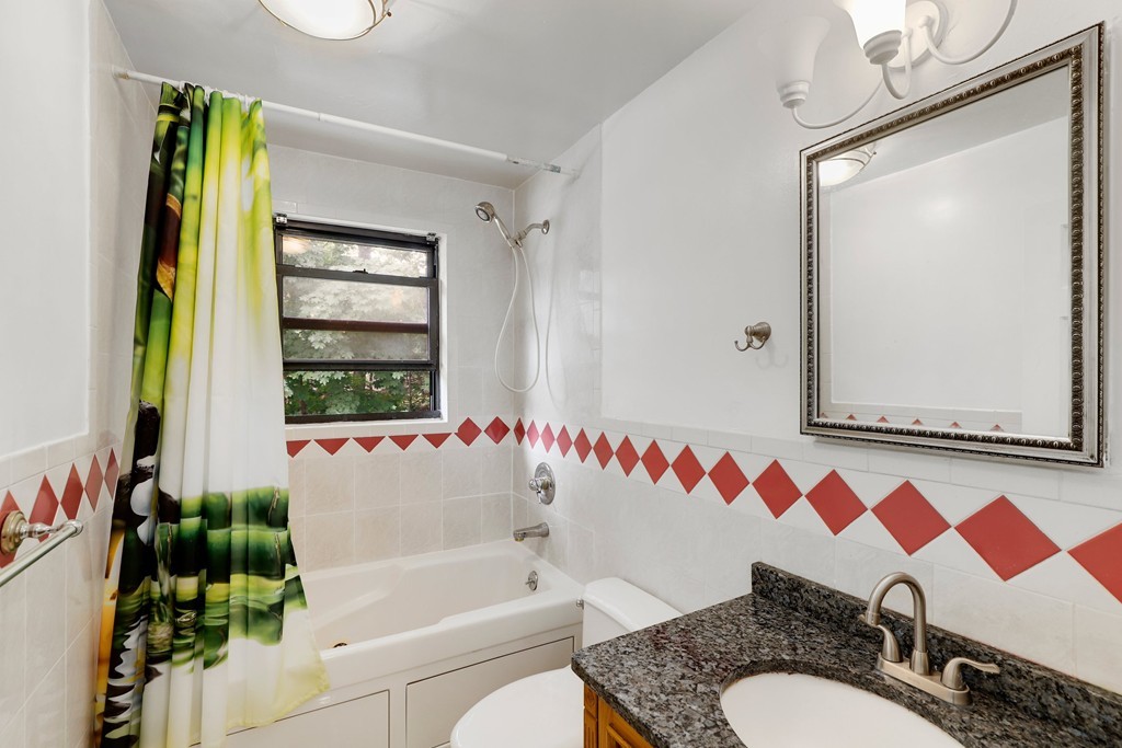 37 Louise Road, Unit 37 Newton, MA 02467 - Photo 18 of 33 a bathroom with a sink and a bathtub