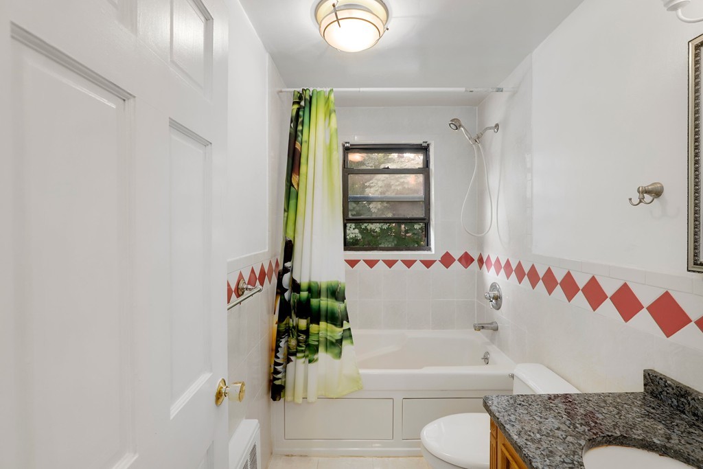 37 Louise Road, Unit 37 Newton, MA 02467 - Photo 19 of 33 a bathroom with a bathtub and a shower