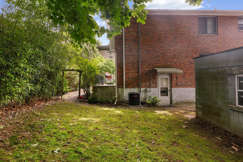 37 Louise Road, Unit 37 Newton, MA 02467 - Photo 32 of 33 a view of a house with a patio