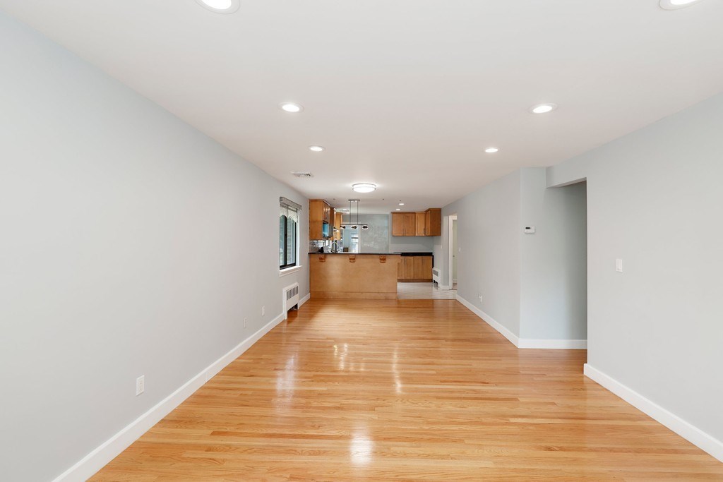 37 Louise Road, Unit 37 Newton, MA 02467 - Photo 5 of 33 a view of kitchen with wooden floor