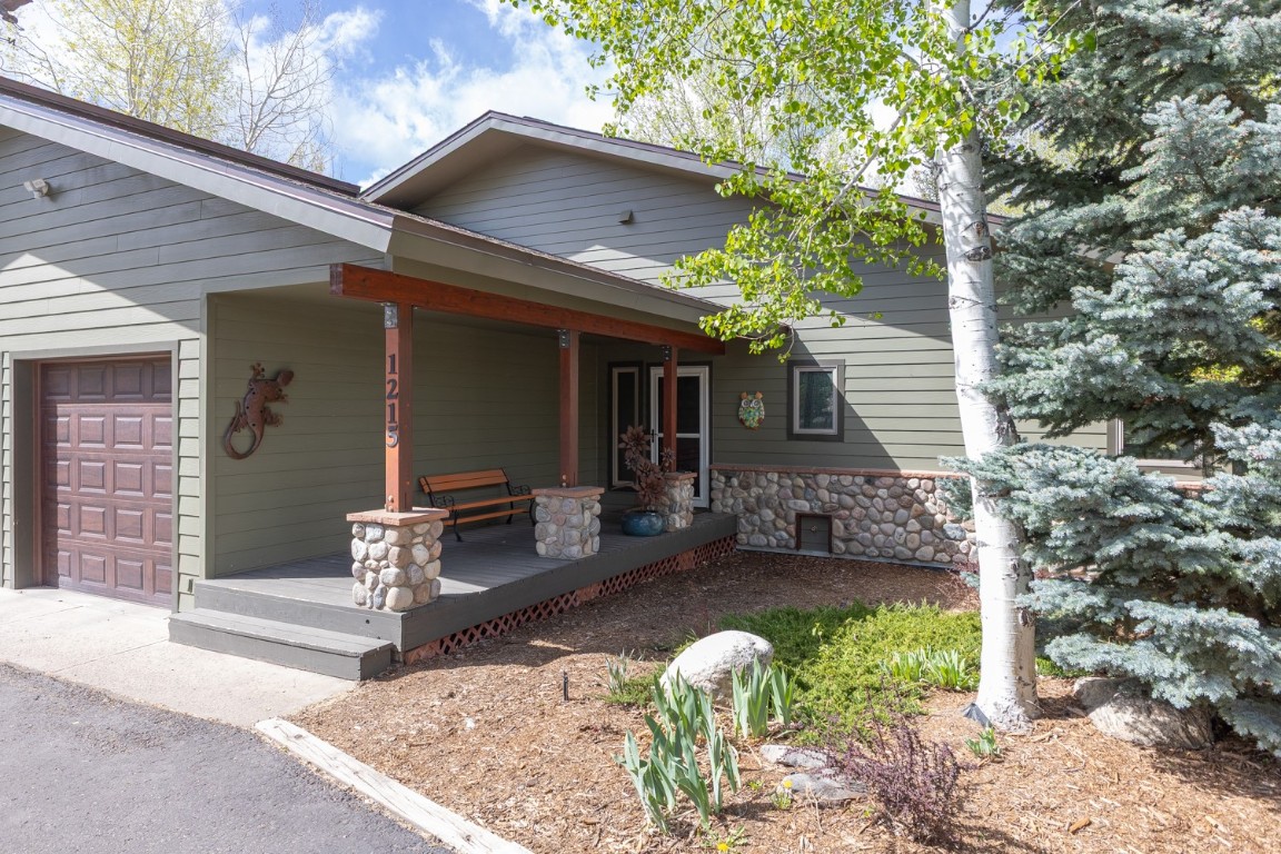 1215 Ridge View Drive Steamboat Springs, CO 80487 - Photo 1 of 30 View of front of home featuring a porch and stone siding