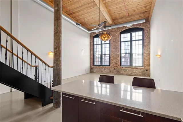 a view of a livingroom with furniture and window