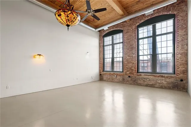 an empty room with windows